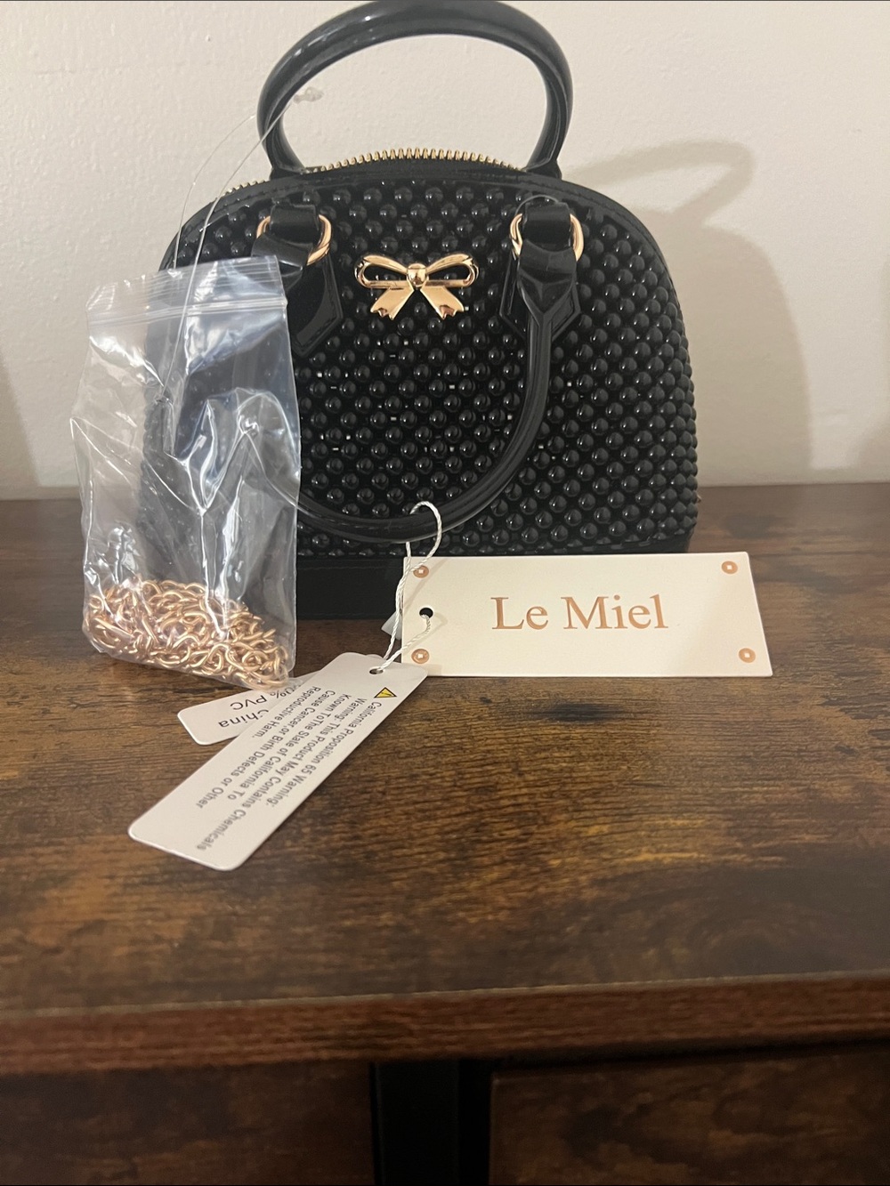 Le Miel Black Beaded Mini Satchel with Gold Bow Accent